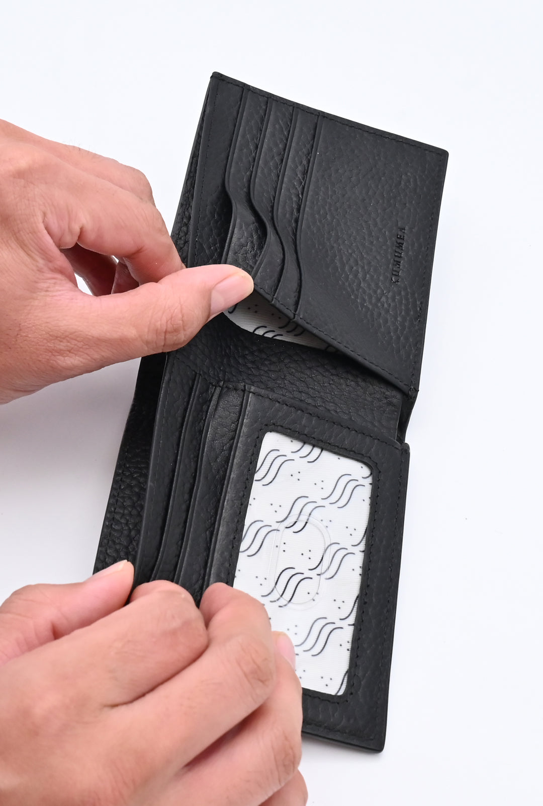 クムメアレザー二つ折り財布